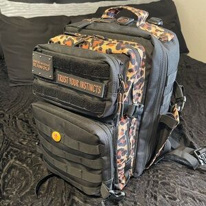 WolfPak Black and Leopard Print Backpack 35L